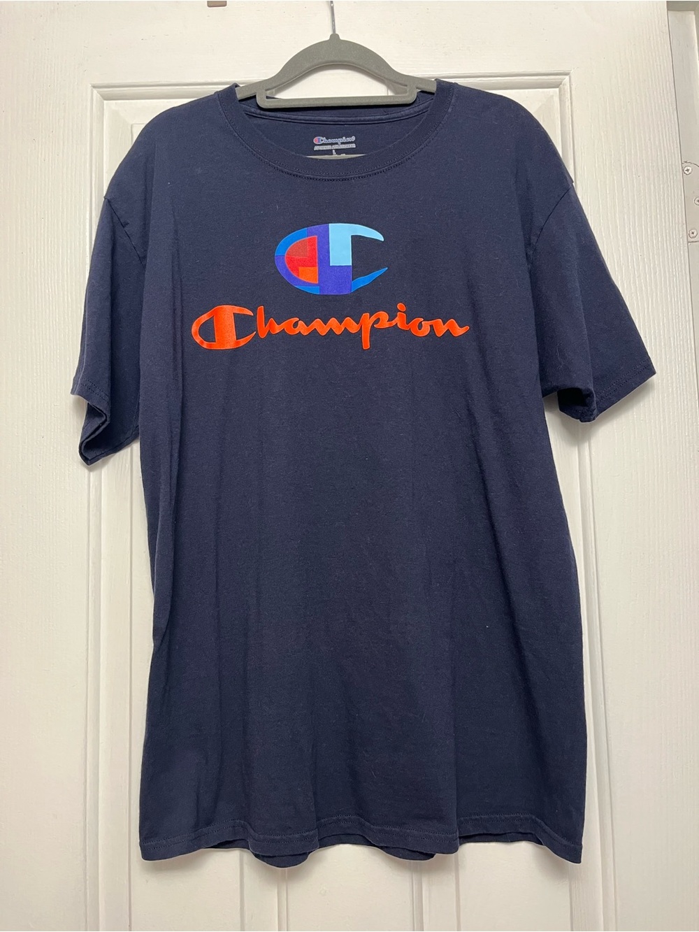 Champion Navy Tee with Orange Script & Multicolor Emblem